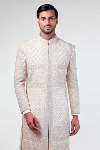 Kommal Sood Off White Raw Silk Embroidery Floral Sherwani Churidar Set at Aza Fashions Kommal Sood_Off White Raw Silk Embroidery Floral Sherwani Churidar Set _at_Aza_Fashions