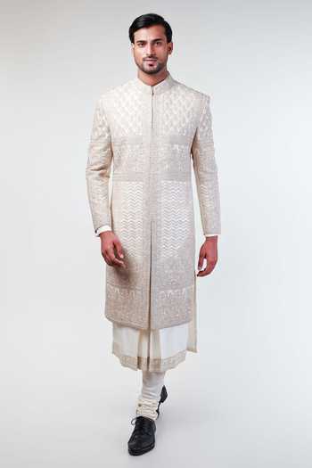 Shop Kommal Sood Off White Raw Silk Embroidery Floral Sherwani Churidar Set Shop_Kommal Sood_Off White Raw Silk Embroidery Floral Sherwani Churidar Set