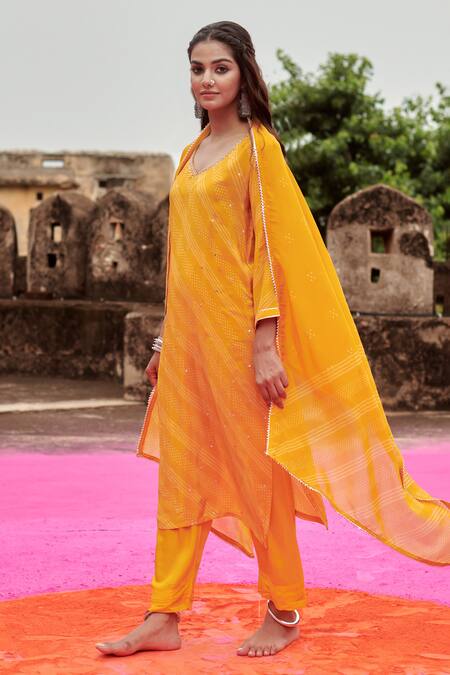 Karaj Jaipur Yellow Crepe, Organza Mirrors, Beads Round Neck And Embroidered Kurta Pant Set at Aza Fashions Karaj Jaipur_Yellow Crepe, Organza Mirrors, Beads Round Neck And Embroidered Kurta Pant Set _at_Aza_Fashions