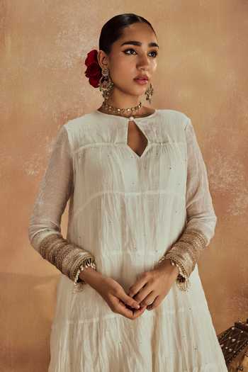 Shop Roze White Muslin, Chanderi Embroidery, Tassels Round Neck Anam Mukaish Anarkali Set Online at Aza Fashions Shop_Roze_White Muslin, Chanderi Embroidery, Tassels Round Neck Anam Mukaish Anarkali Set _Online_at_Aza_Fashions