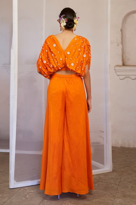 Shop_Mona And Vishu_Orange Silk Beads, Embroidery, Pearls V-neck Top And Palazzo Set _at_Aza_Fashions