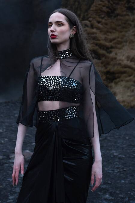 Dash And Dot Black Polyester Mirrors Embroidered Cape And Draped Dhoti Skirt Set at Aza Fashions Dash And Dot_Black Polyester Mirrors Embroidered Cape And Draped Dhoti Skirt Set_at_Aza_Fashions