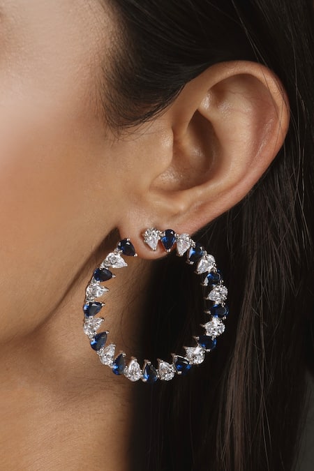 Round Blue Diamond Three Stone Stud Earrings | Angara