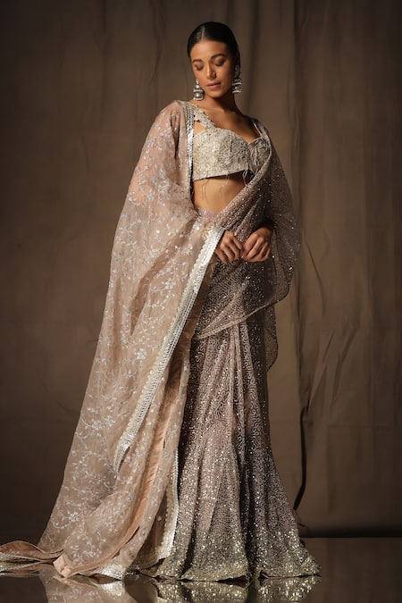 tara thakur_Beige Net Sequins Sweetheart Neck Embroidered Pre-draped Saree With Blouse _at_Aza_Fashions