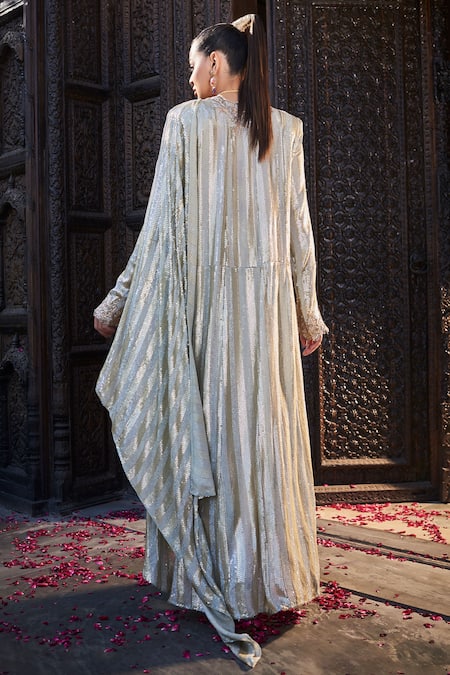 Shop tara thakur Ivory Polyester Sequins V-neck, Embroidered Pre-draped Saree Set With Jacket at Aza Fashions Shop_tara thakur_Ivory Polyester Sequins V-neck, Embroidered Pre-draped Saree Set With Jacket _at_Aza_Fashions