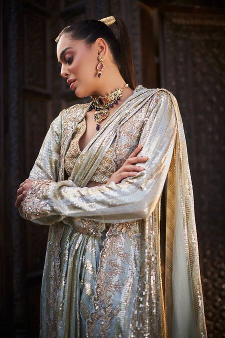 Shop tara thakur Ivory Polyester Sequins V-neck, Embroidered Pre-draped Saree Set With Jacket Online at Aza Fashions Shop_tara thakur_Ivory Polyester Sequins V-neck, Embroidered Pre-draped Saree Set With Jacket _Online_at_Aza_Fashions