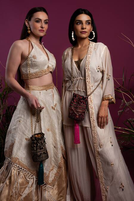 tara thakur_Ivory Organza Zari, Embroidery Halter Neck Layered Lehenga With Top _at_Aza_Fashions