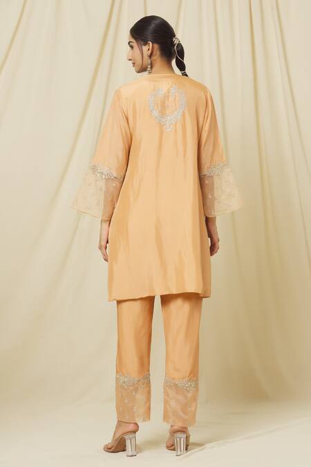 Shop Omana By Ranjana Bothra Peach Tussar, Cotton, Organza Sequins, Nusrat Flora Vine Marodi Kurta Pant Set at Aza Fashions Shop_Omana By Ranjana Bothra_Peach Tussar, Cotton, Organza Sequins, Nusrat Flora Vine Marodi Kurta Pant Set _at_Aza_Fashions