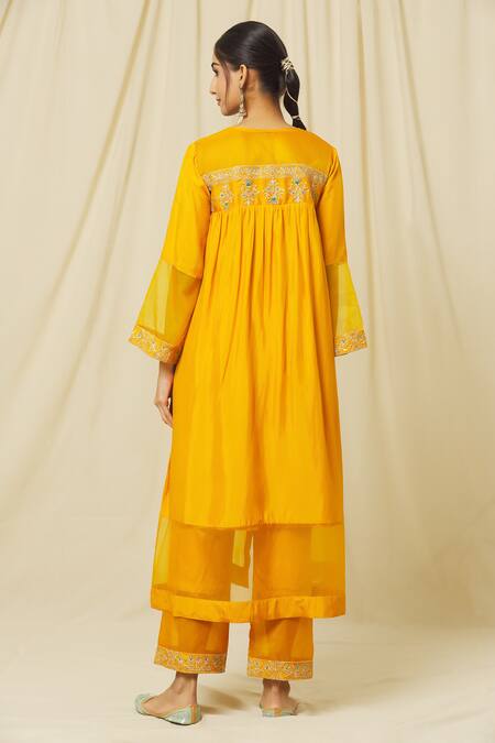 Shop Omana By Ranjana Bothra Yellow Tussar, Cotton, Organza Sequins, Zeenat Gardenia Marodi Kurta Pant Set at Aza Fashions Shop_Omana By Ranjana Bothra_Yellow Tussar, Cotton, Organza Sequins, Zeenat Gardenia Marodi Kurta Pant Set _at_Aza_Fashions