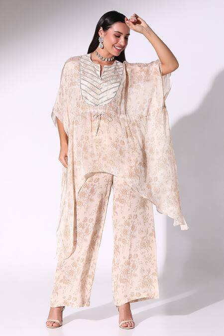 Buy SAKSHI GIRRI Beige Chiffon, Crepe Embroidery Split V-neck Floral Print Kaftan Pant Set Online at Aza Fashions Buy_SAKSHI GIRRI_Beige Chiffon, Crepe Embroidery Split V-neck Floral Print Kaftan Pant Set_Online_at_Aza_Fashions
