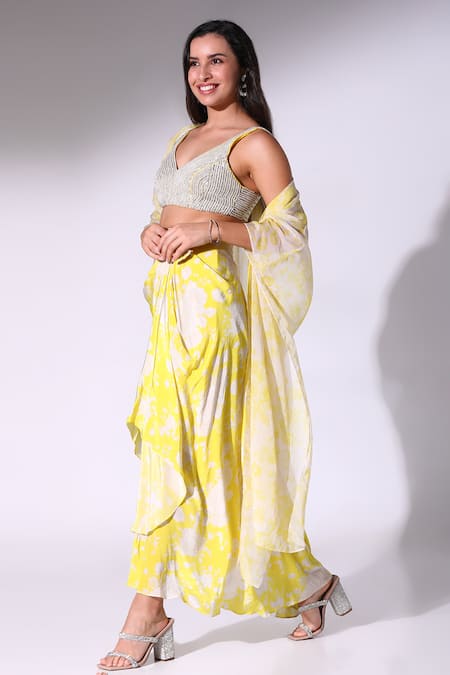 Shop_SAKSHI GIRRI_Yellow Organza, Crepe Beads V-neck Printed Draped Skirt Cape Set_Online_at_Aza_Fashions