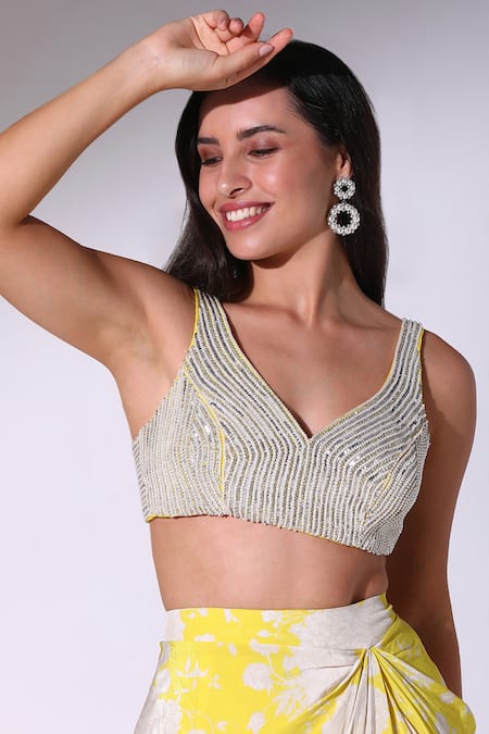 SAKSHI GIRRI_Yellow Organza, Crepe Beads V-neck Printed Draped Skirt Cape Set_at_Aza_Fashions