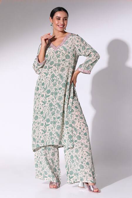 SAKSHI GIRRI_Green Crepe V-neck Zinnia Blossom Print Kurta With Flared Pant_Online_at_Aza_Fashions