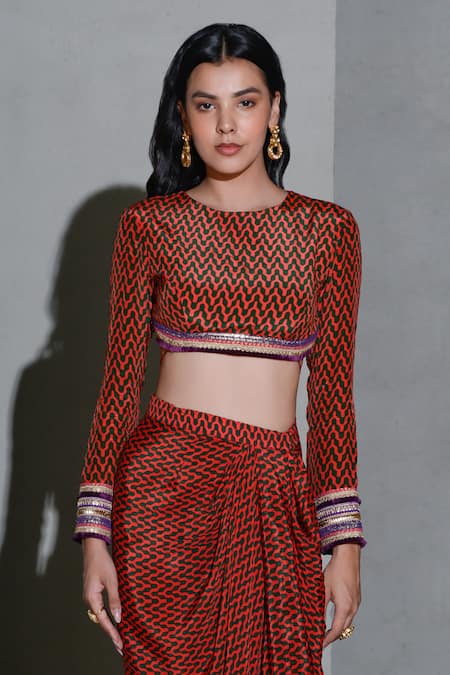 Shop Rishi and Vibhuti Red Crepe Embroidery Round Neck Geometric Print Blouse With Asymmetric Skirt Online at Aza Fashions Shop_Rishi and Vibhuti_Red Crepe Embroidery Round Neck Geometric Print Blouse With Asymmetric Skirt _Online_at_Aza_Fashions