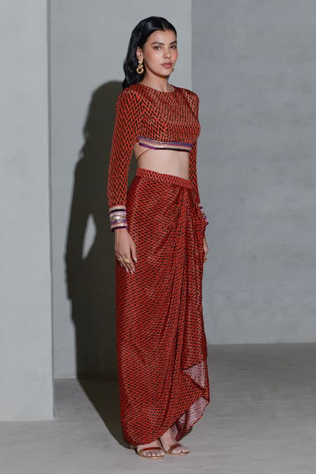 Rishi and Vibhuti Red Crepe Embroidery Round Neck Geometric Print Blouse With Asymmetric Skirt at Aza Fashions Rishi and Vibhuti_Red Crepe Embroidery Round Neck Geometric Print Blouse With Asymmetric Skirt _at_Aza_Fashions