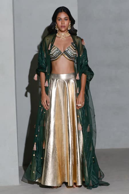 Rishi and Vibhuti Gold Organza And Vegan Leather Embellished Metallic Lehenga Tassel Work Cape Set 