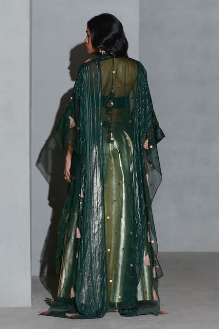 Shop Rishi and Vibhuti Gold Organza, Velvet Sequins, Pearls Metallic Lehenga Tassel Work Cape Set at Aza Fashions Shop_Rishi and Vibhuti_Gold Organza, Velvet Sequins, Pearls Metallic Lehenga Tassel Work Cape Set _at_Aza_Fashions