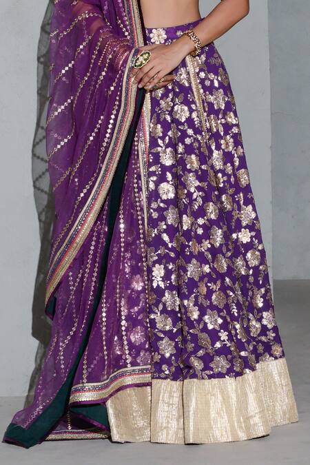Rishi and Vibhuti Purple Net, Silk Sequins, Mirrors V-neck Floral Embellished Lehenga Set Online at Aza Fashions Rishi and Vibhuti_Purple Net, Silk Sequins, Mirrors V-neck Floral Embellished Lehenga Set _Online_at_Aza_Fashions