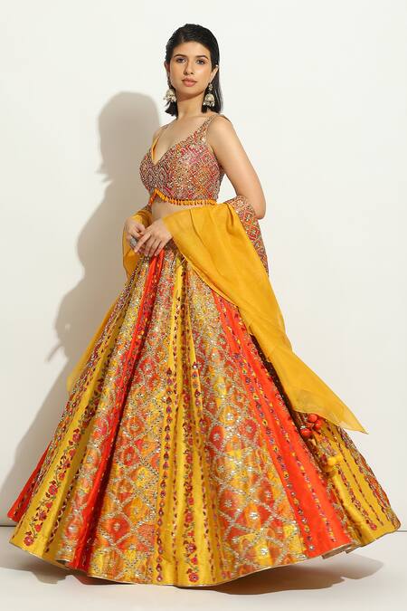 Shop_Vandana Sethi_Yellow Brocade Sequins Asymmetric Embroidered Bridal Lehenga Set _Online_at_Aza_Fashions