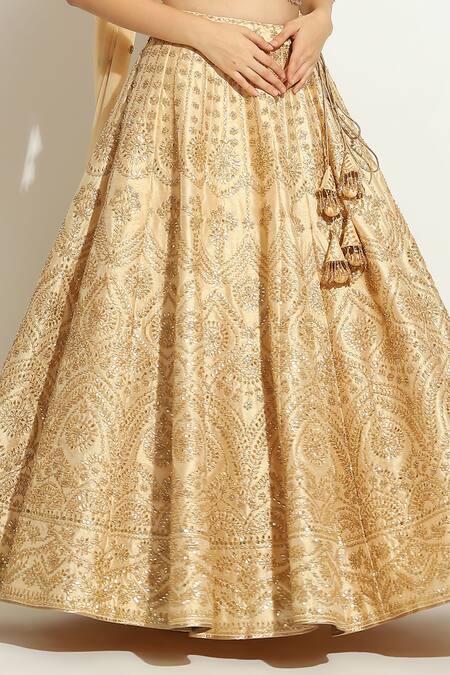 Shop_Vandana Sethi_Gold Silk Sequins, Crystals, Tassels Embroidered Floral Bridal Lehenga Set _Online_at_Aza_Fashions
