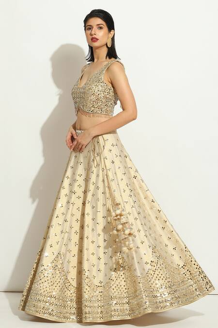 Shop_Vandana Sethi_Ivory Silk Crystals, Mirrors V-neck Scalloped Pattern Lehenga Set _Online_at_Aza_Fashions