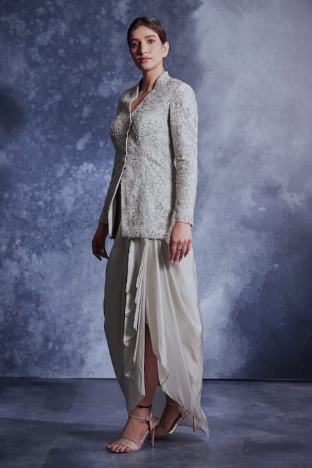 Shop Varun Chakkilam Grey Silk Organza Embroidered Sequin V Neck Jacket And Draped Skirt Set at Aza Fashions Shop_Varun Chakkilam_Grey Silk Organza Embroidered Sequin V Neck Jacket And Draped Skirt Set _at_Aza_Fashions