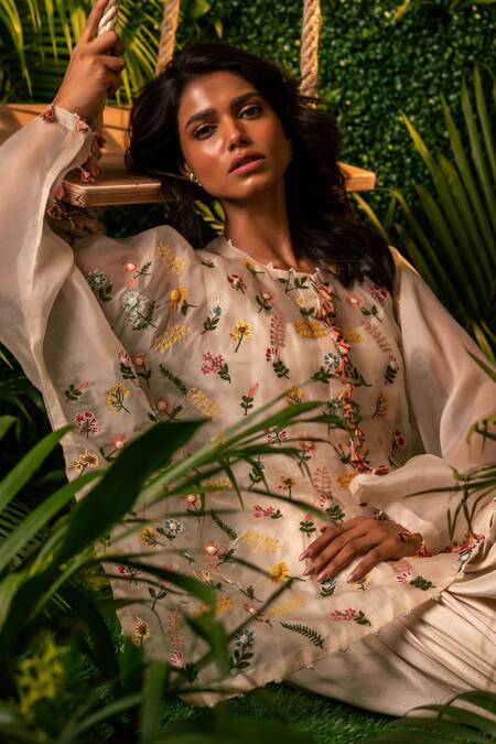 Pallavi Poddar_Ivory Organza, Satin, Lycra Garland Floral Embroidered Top And Draped Skirt Set _Online_at_Aza_Fashions