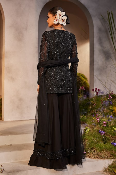 Shop Charu And Vasundhara Black Net, Organza Sequins, Cut Work, Beads, Lennon Kurta Sharara Set at Aza Fashions Shop_Charu And Vasundhara_Black Net, Organza Sequins, Cut Work, Beads, Lennon Kurta Sharara Set _at_Aza_Fashions