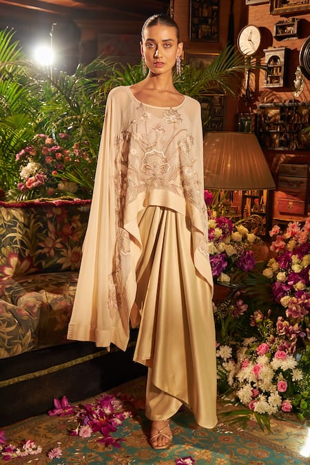 Shop Shreeka Beige Viscose, Satin Sequins, Beads, Zari Floral Embroidered Cape Skirt Set at Aza Fashions Shop_Shreeka_Beige Viscose, Satin Sequins, Beads, Zari Floral Embroidered Cape Skirt Set _at_Aza_Fashions