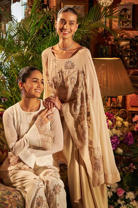 Shop Shreeka Beige Viscose, Satin Sequins, Beads, Zari Floral Embroidered Cape Skirt Set Online at Aza Fashions Shop_Shreeka_Beige Viscose, Satin Sequins, Beads, Zari Floral Embroidered Cape Skirt Set _Online_at_Aza_Fashions