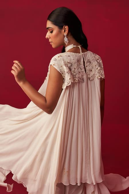 Shop Adaara Couture Ivory Georgette Cut Work, Pixelated Floral Embroidered Top And Dhoti Pant Set at Aza Fashions Shop_Adaara Couture_Ivory Georgette Cut Work, Pixelated Floral Embroidered Top And Dhoti Pant Set _at_Aza_Fashions
