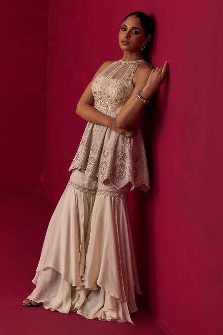 Adaara Couture Ivory Chanderi, Satin, Organza Cut Mandala Embroidered Peplum Top And Sharara Set at Aza Fashions Adaara Couture_Ivory Chanderi, Satin, Organza Cut Mandala Embroidered Peplum Top And Sharara Set _at_Aza_Fashions
