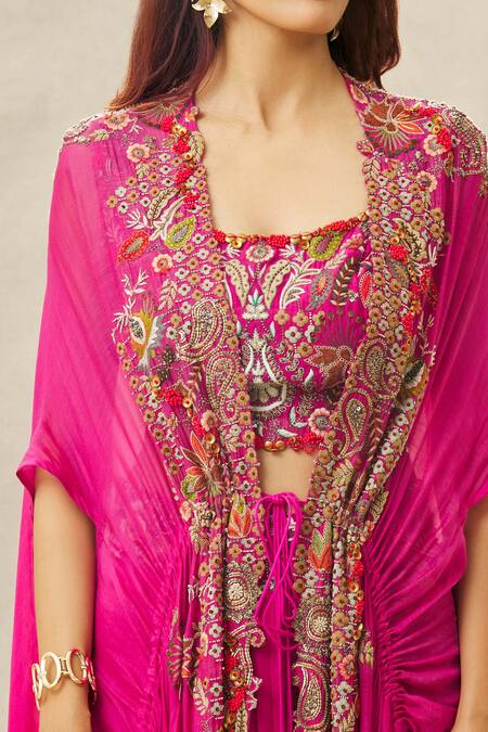 Shop Anamika Khanna Fuchsia Cotton, Silk Sequins, Beads Border Embroidered Cape Draped Skirt Set Online at Aza Fashions Shop_Anamika Khanna_Fuchsia Cotton, Silk Sequins, Beads Border Embroidered Cape Draped Skirt Set_Online_at_Aza_Fashions