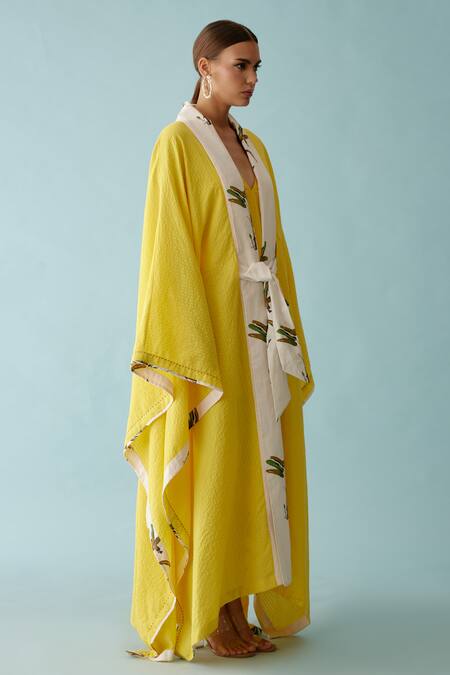 Nikasha Yellow Banana Leaf Print Lapel Collar Seersucker Cape Online at Aza Fashions Nikasha_Yellow Banana Leaf Print Lapel Collar Seersucker Cape _Online_at_Aza_Fashions