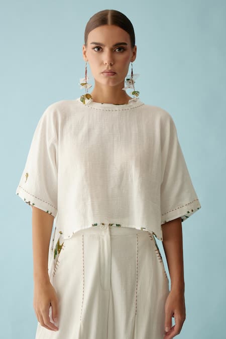 Nikasha_Off White , Satin Applique Round Neck High Low Crop Top _Online_at_Aza_Fashions