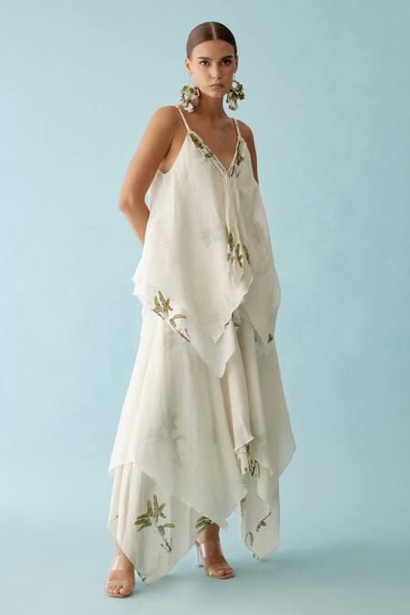 Nikasha Off White Cotton Embroidery V-neck Asymmetrical Layered Top And Skirt Set Online at Aza Fashions Nikasha_Off White Cotton Embroidery V-neck Asymmetrical Layered Top And Skirt Set _Online_at_Aza_Fashions