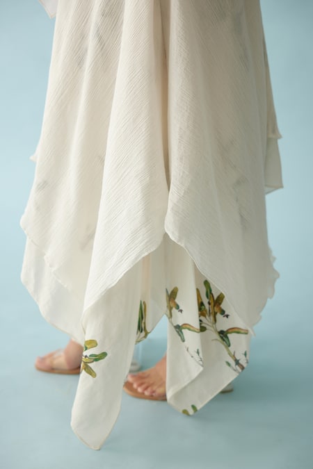 Buy Nikasha Off White Cotton Embroidery V-neck Asymmetrical Layered Top And Skirt Set Online at Aza Fashions Buy_Nikasha_Off White Cotton Embroidery V-neck Asymmetrical Layered Top And Skirt Set _Online_at_Aza_Fashions