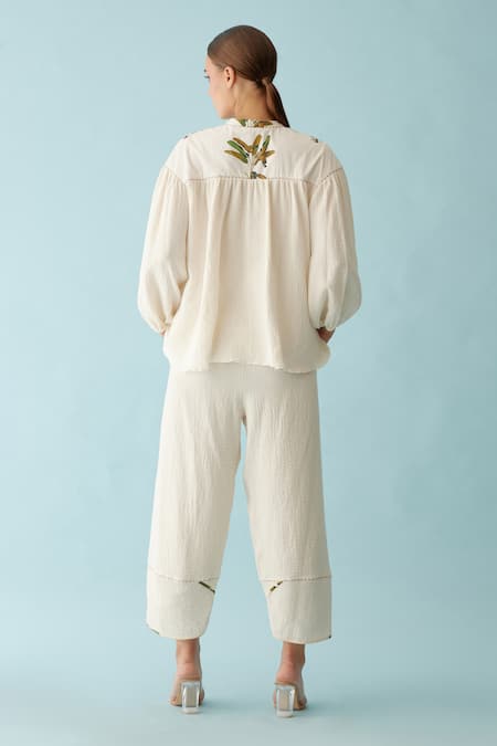 Shop Nikasha Cream Cotton Bandeau Neck Banana Tree Print Top And Pant Set at Aza Fashions Shop_Nikasha_Cream Cotton Bandeau Neck Banana Tree Print Top And Pant Set _at_Aza_Fashions