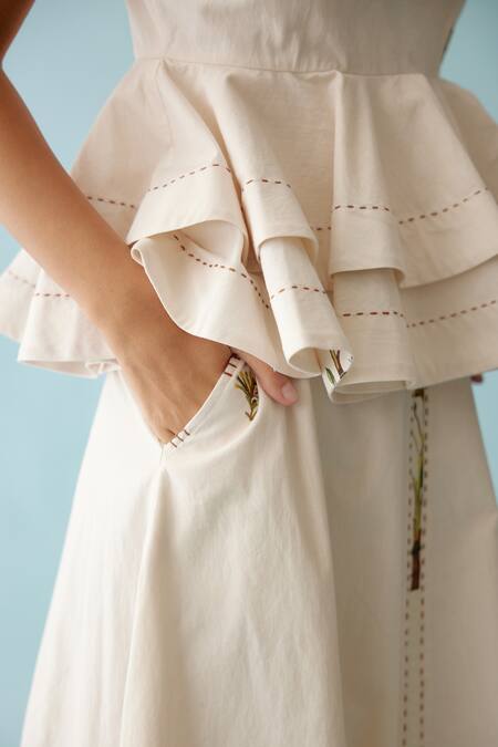 Nikasha Cream Poplin Embroidery, Applique V-neck Banana Tree Top And Skirt Set at Aza Fashions Nikasha_Cream Poplin Embroidery, Applique V-neck Banana Tree Top And Skirt Set _at_Aza_Fashions