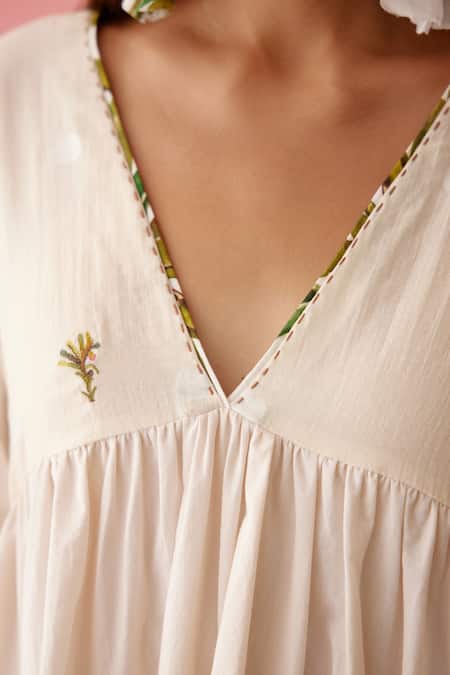 Nikasha_Cream Jersey, Cotton Applique, Embroidery V-neck Solid Bubble Sleeve Tier Dress _at_Aza_Fashions