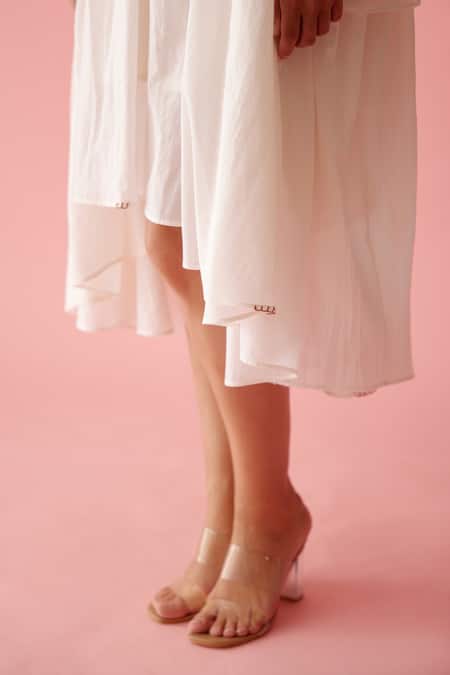 Shop_Nikasha_Cream Cotton Tassels V-neck Banana Tree Print Yoke Frill Dress _Online_at_Aza_Fashions