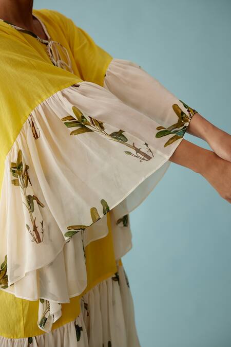 Nikasha_Yellow Cotton Tassels Round Neck Banana Tree Print Frill Dress _at_Aza_Fashions