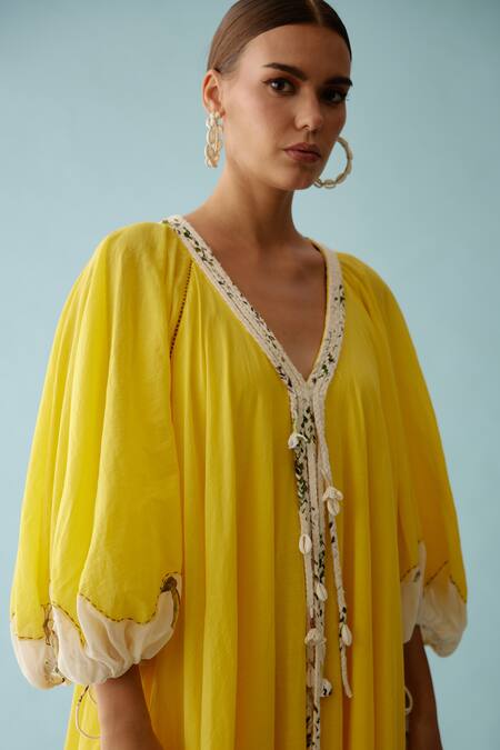 Nikasha Yellow Cotton V-neck Frond Print Braided Tassel Maxi Dress Online at Aza Fashions Nikasha_Yellow Cotton V-neck Frond Print Braided Tassel Maxi Dress _Online_at_Aza_Fashions