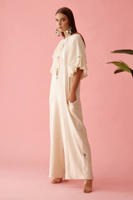 Nikasha_Cream Cotton Fringe Round Neck Neckline Jumpsuit _Online_at_Aza_Fashions
