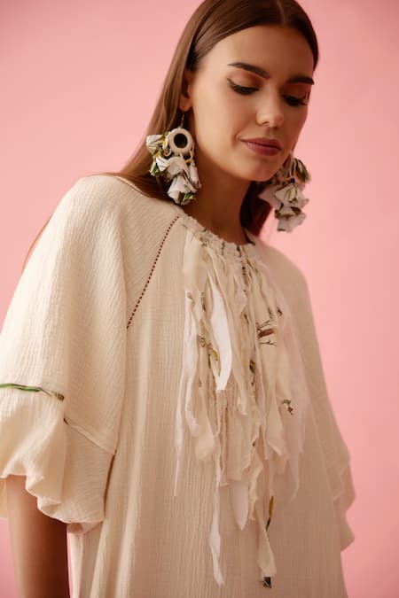 Shop_Nikasha_Cream Cotton Fringe Round Neck Neckline Jumpsuit _Online_at_Aza_Fashions