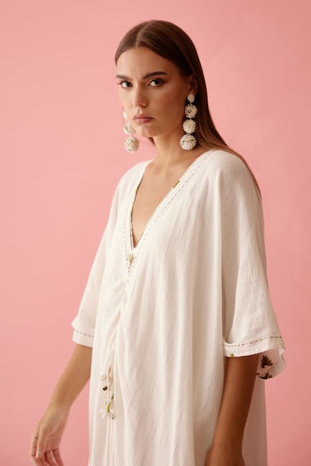 Nikasha_Off White Cotton Tassels V-neck Ruched Yoke Long Kaftan _Online_at_Aza_Fashions