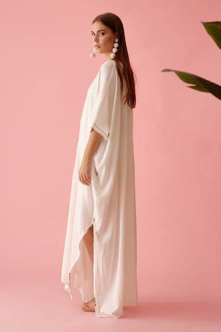 Nikasha_Off White Cotton Tassels V-neck Ruched Yoke Long Kaftan _at_Aza_Fashions