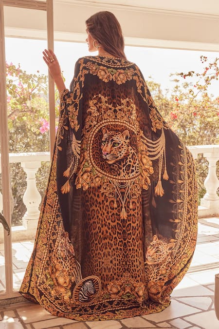 Shop Zariaah Black Viscose, Silk Crystals V-neck Cleopatra Leopard Print Dress With Cape at Aza Fashions Shop_Zariaah_Black Viscose, Silk Crystals V-neck Cleopatra Leopard Print Dress With Cape _at_Aza_Fashions