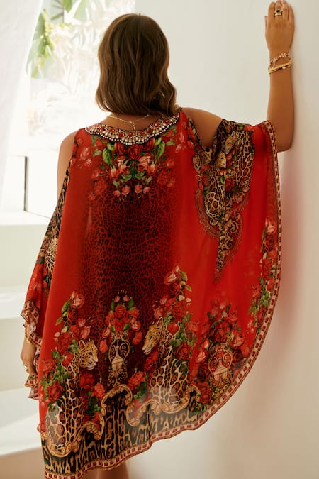 Shop Zariaah Red Viscose, Silk Crystals V-neck Rosette Bloom Print Cold Shoulder Kaftan at Aza Fashions Shop_Zariaah_Red Viscose, Silk Crystals V-neck Rosette Bloom Print Cold Shoulder Kaftan _at_Aza_Fashions