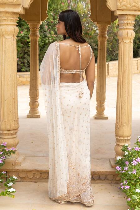 Shop Arpita Mehta Ivory Net Mirrors, Sequins V-neck Embroidered Saree And Blouse Set at Aza Fashions Shop_Arpita Mehta_Ivory Net Mirrors, Sequins V-neck Embroidered Saree And Blouse Set_at_Aza_Fashions